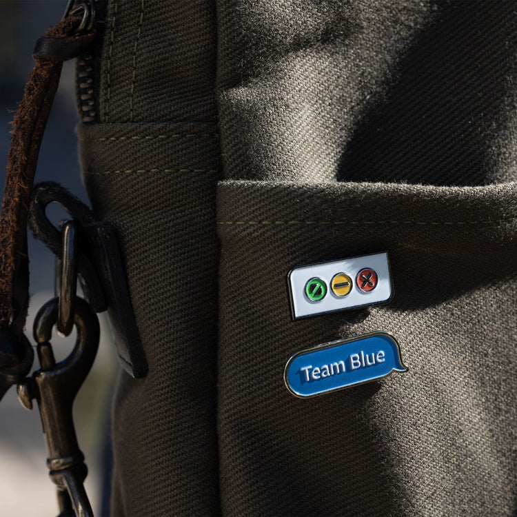 12s_Merch_MacPack_Pins_Lifestyle_04_HiRes