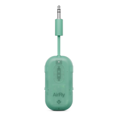 Green AirFly audio adapter on a white background