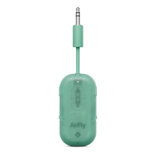 Green AirFly audio adapter on a white background