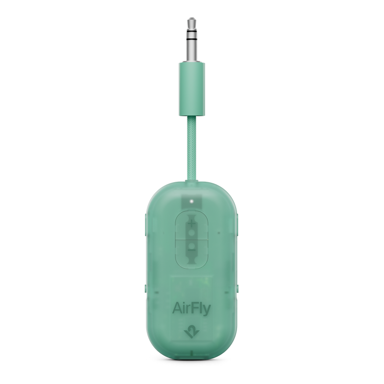 Green AirFly audio adapter on a white background
