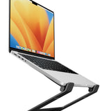 Laptop on a stand with a colorful display on a white background