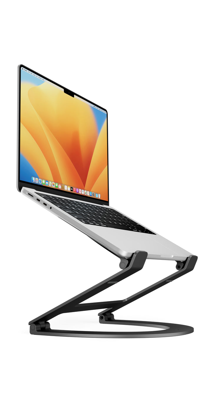 Laptop on a stand with a colorful display on a white background