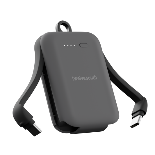 Portable battery pack with USB cables on a white background, featuring the Twelve South brand.
