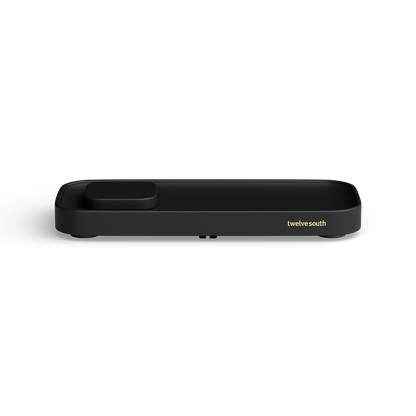 A black rectangular valet charger with rounded corners, featuring a small recessed slot on one end and the gold text 'twelve south' on the side, shown against a plain white background.