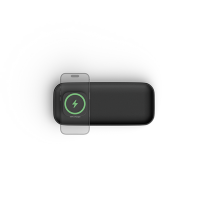 A black rectangular charger with rounded corners, shown from a top-down view on a white background. A smartphone is partially overlaid on the left side, and the charger has a green circular charging icon printed on it.